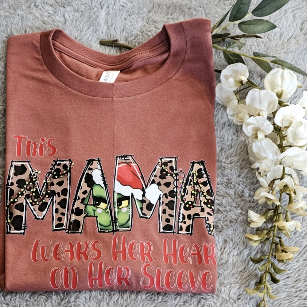 This Mama wears her heart on her sleeve t-shirt color clay